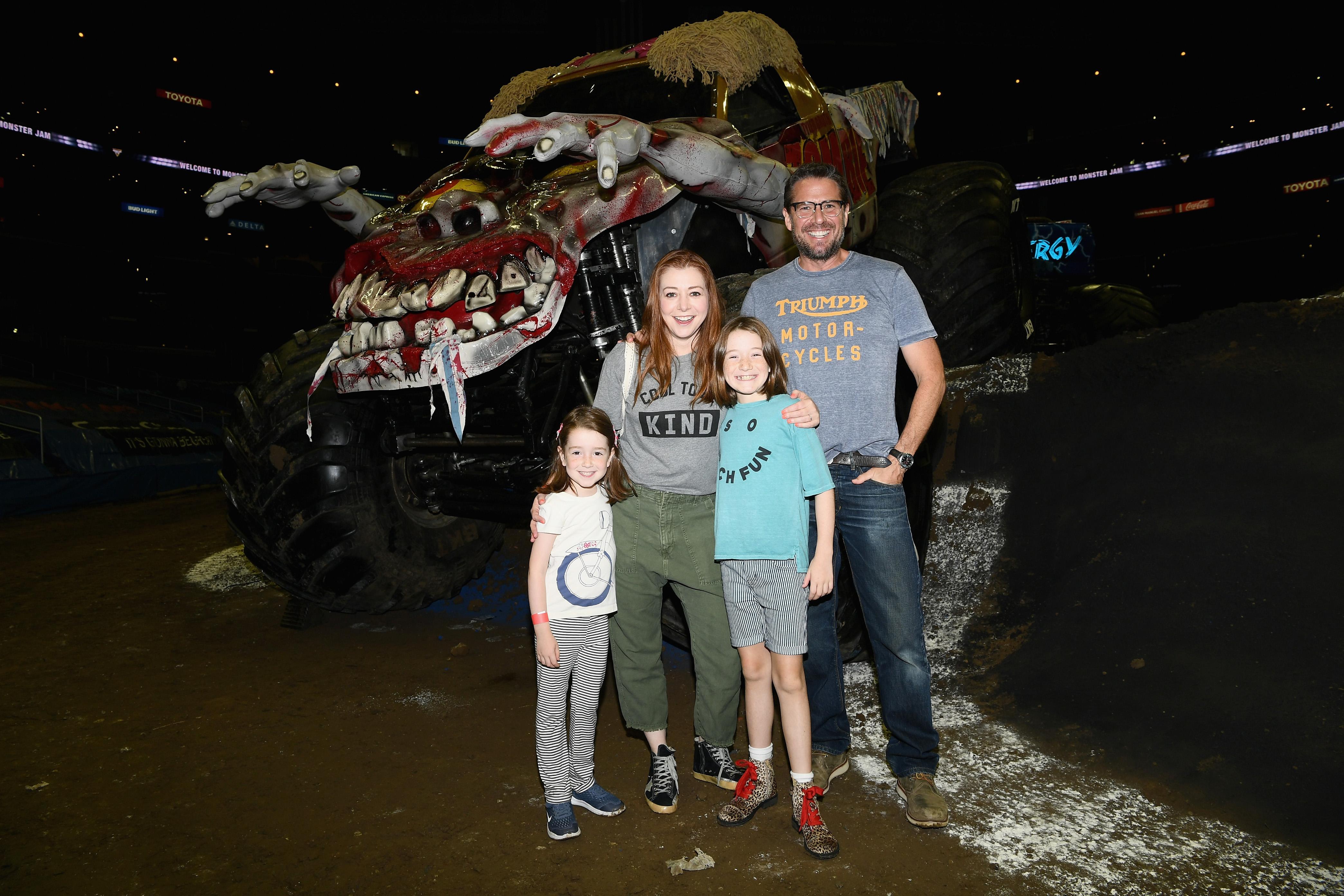 Alyson and Alexis with their daughters in 2018.