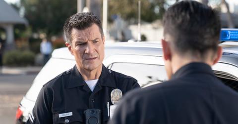 John Nolan wearing his police uniform in 'The Rookie'.