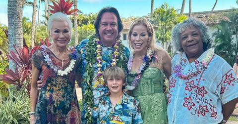 Angus Mitchell with his family in leis on Thanksgiving.