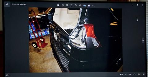 A photo of the taillight of Karen Read's SUV is shown during her trial