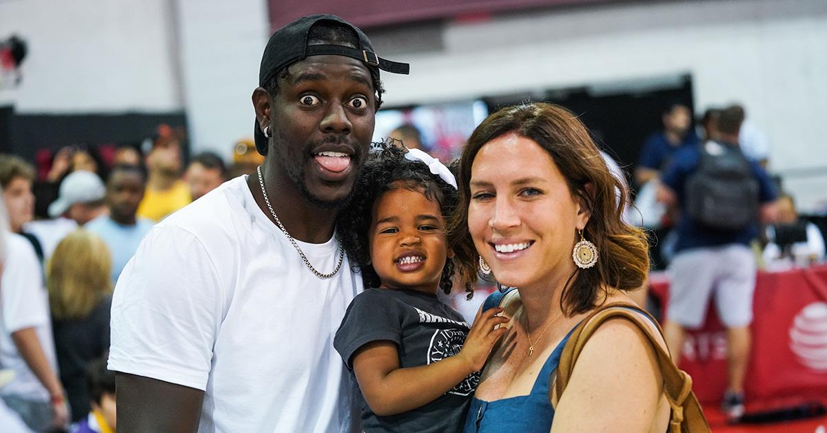 Jrue and Lauren Holiday with their son in 2019. 