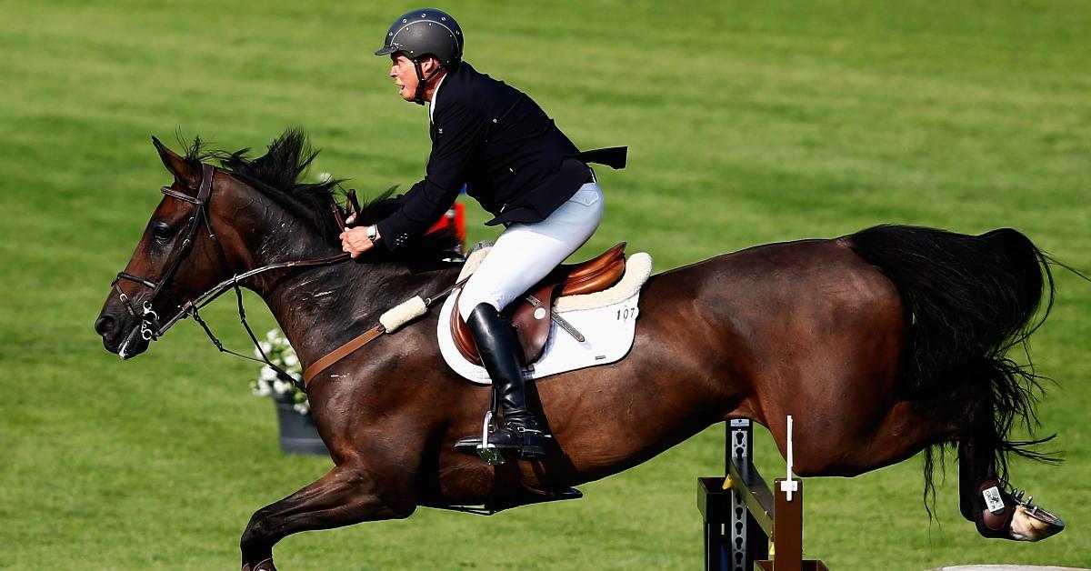 VALKENSWAARD, NETHERLANDS - AUGUST 13: Federico Fernandez of Mexico riding Guru competes in the Class 02 CSI5* 1.50/1.55m Against the Clock with Jump-Off during the Longines Global Champions Tour held at Stal Tops on August 13, 2015 in Valkenswaard, Netherlands. (Photo by Dean Mouhtaropoulos/Getty Images)