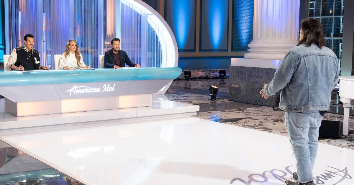 An American Idol contestant performs for Lionel Richie, Carrie Underwood, and Luke Bryan.
