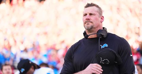 Dan Campbell taking his hat off for the national anthem.