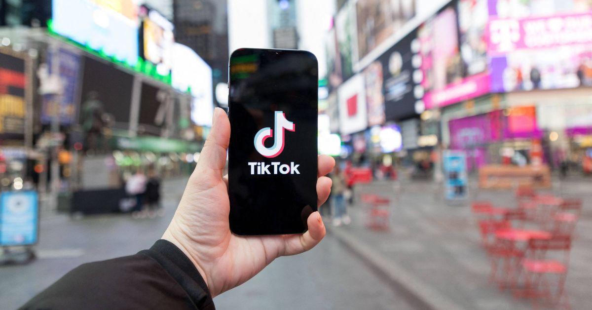 The TikTok logo on a phone in New York City.