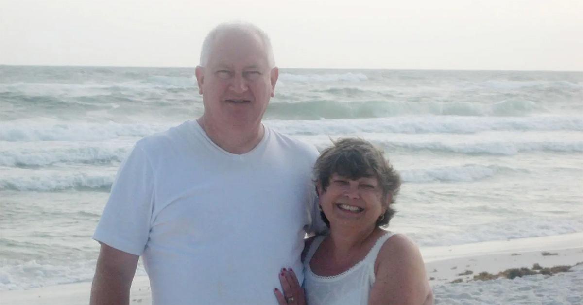 Jeff Walz with a woman on the beach. 