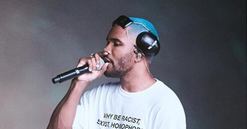 Frank Ocean wearing headphones during a performance