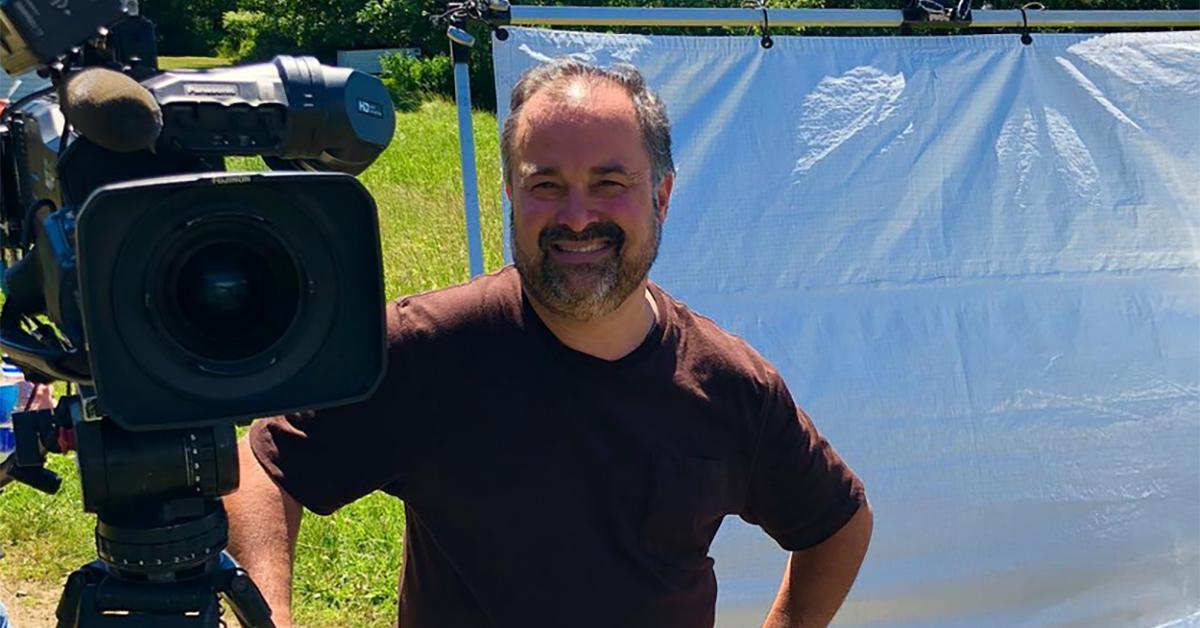 Frank Fritz standing in front of a production camera