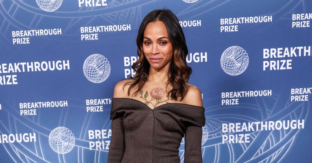 Zoe Saldaña on the red carpet at an event.