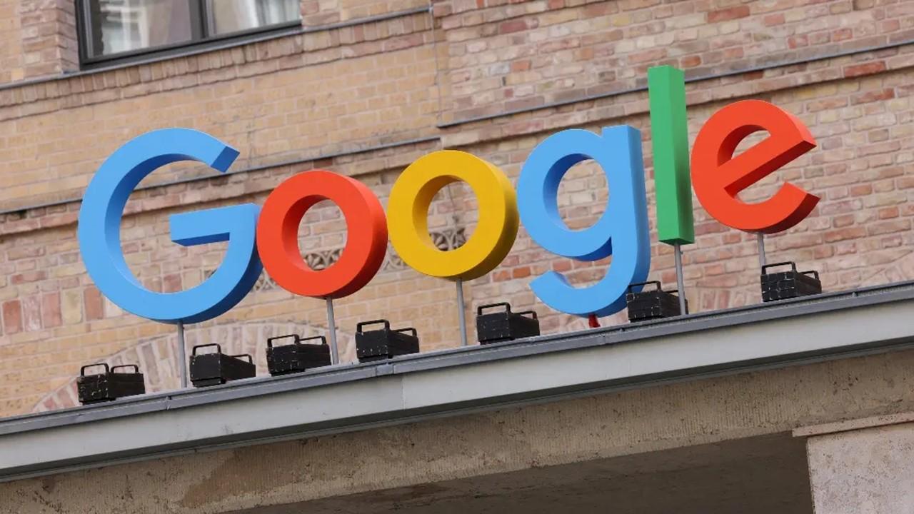 A Google sign on a brick building 