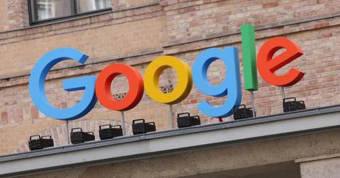 A Google sign on a brick building