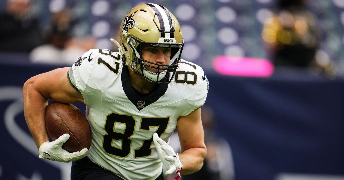 Foster Moreau of the New Orleans Saints warms up prior to an NFL football game in 2023