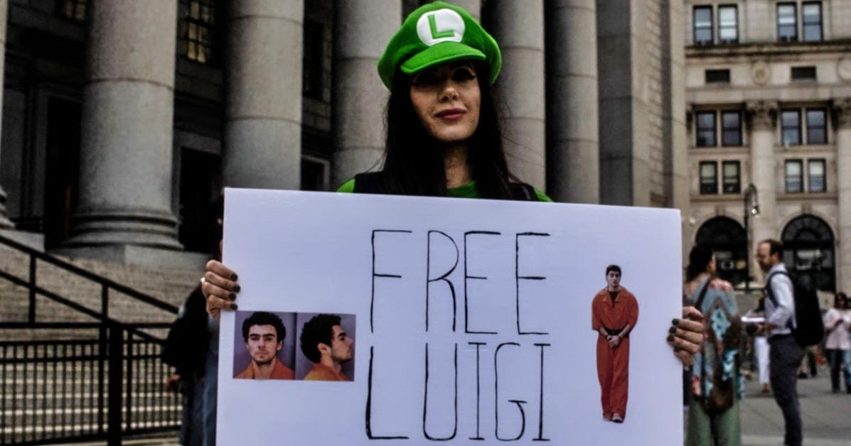 Protestor outside of one of Luigi Mangione's hearings
