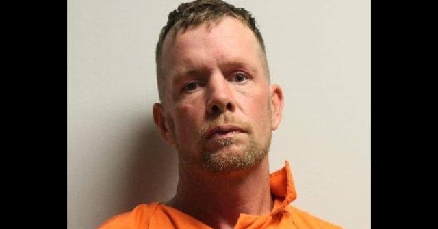 david anthony burns in orange jumpsuit