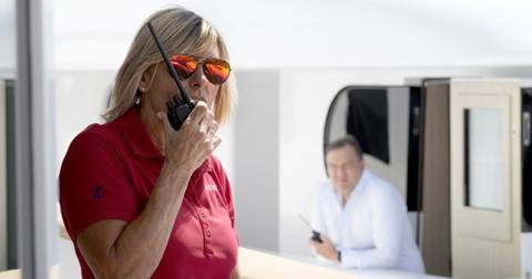 Captain Sandy Yawn speaking into a walkie talkie on 'Below Deck Med' Season 9