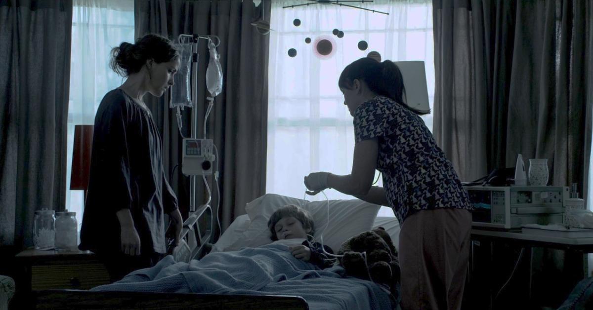 Dalton Lambert falls into a coma in 2010's 'Insidious,' and his mother, Renai, stands by his bedside.