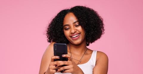 young black girl texting