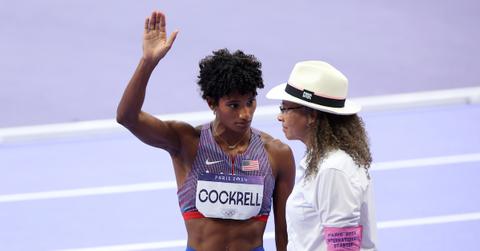 : Anna Cockrell talks to a judge during the Women's 400m Hurdles Semi-Final on day eleven of the Olympic Games Paris 2024 at Stade de France on Aug. 6, 2024 in Paris,
