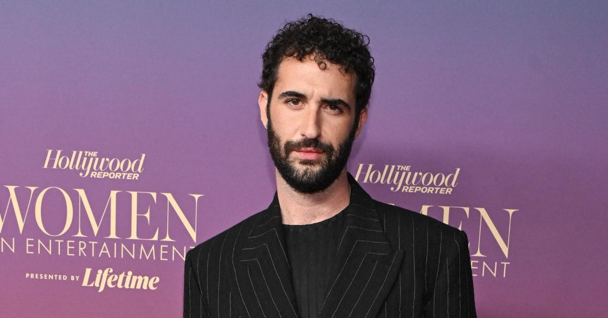 Jordan Firstman posing at an event