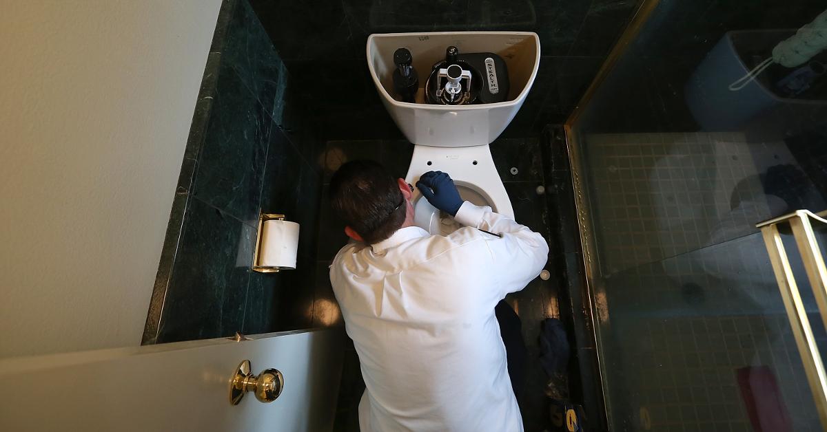 Plumber fixing a sink