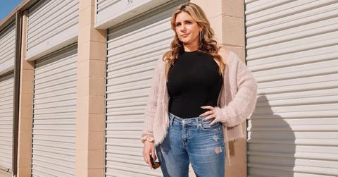 Brandi Passante from 'Storage Wars' in front of units.