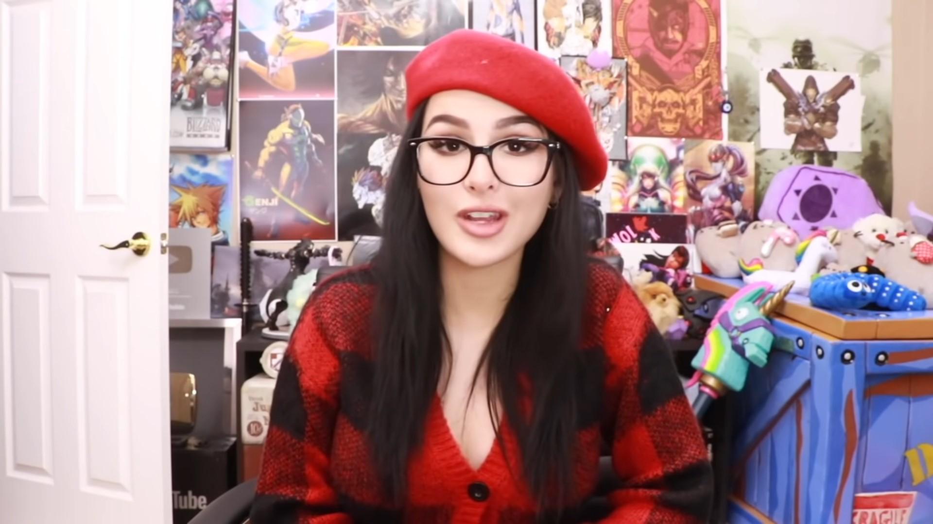 Image of YouTuber SSSniperwolf talking to fans in video.