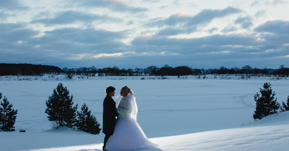 bride and groom and winter lanscape picture id