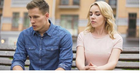 upset couple sitting next to each other angry guy jealous girl about picture id