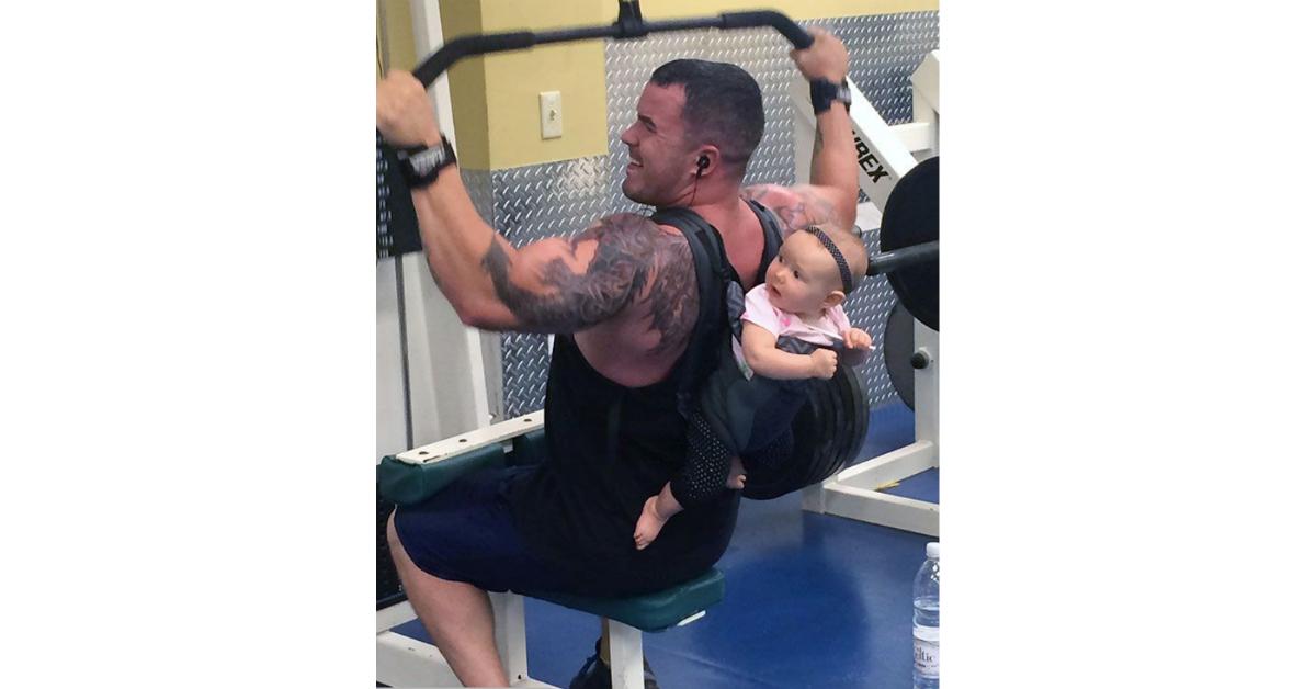 guyworkingoutwithbaby