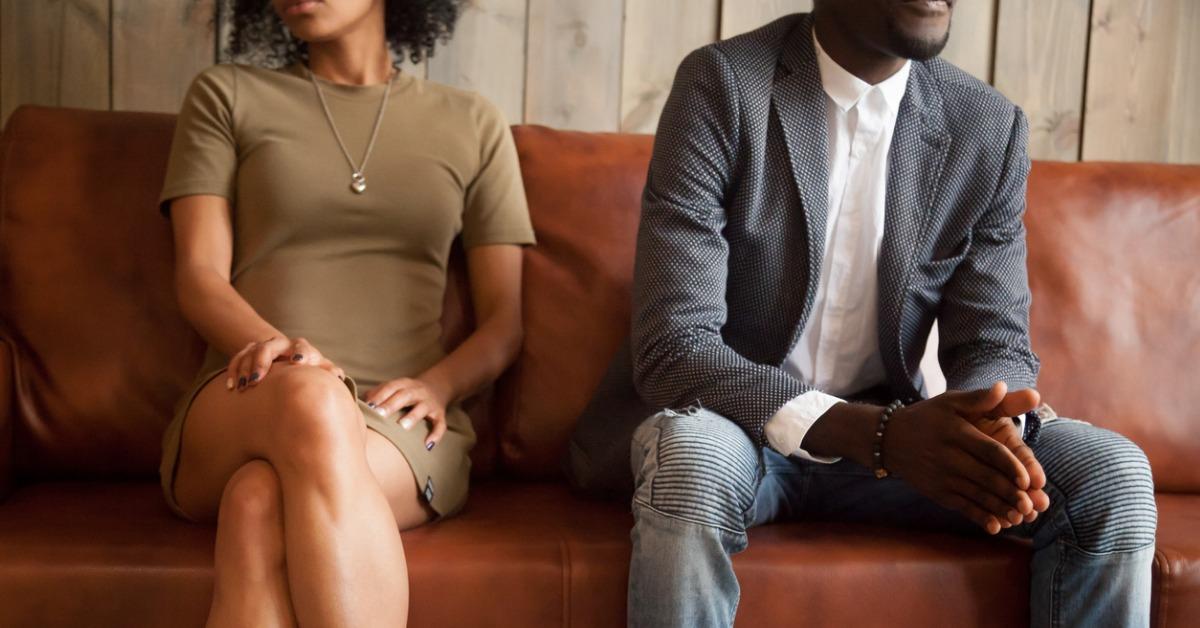 africanamerican couple sitting on couch after quarrel bad concept picture id