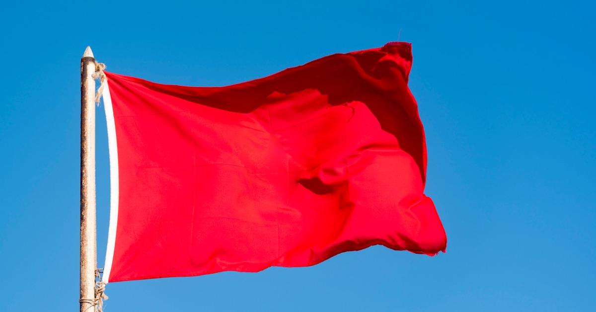 old-red-flag-and-blue-sky-red-banner-waving-against-blue-sky-picture-id908587472-1542298523735-1542298525724.jpg