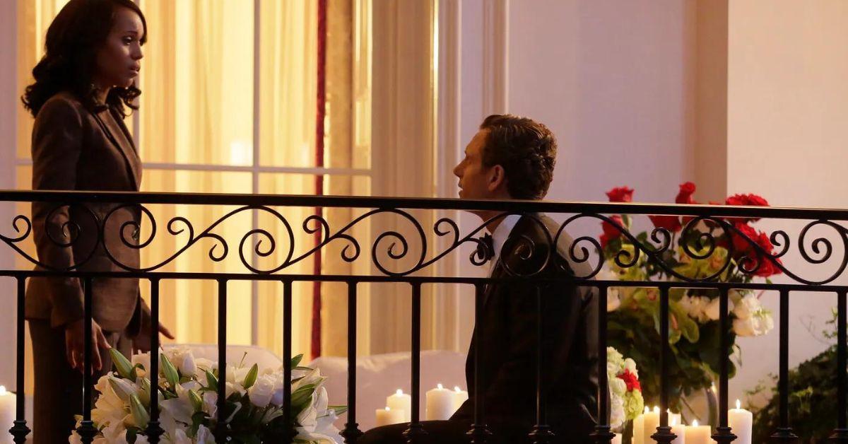 Fitz gets down on one knee to propose to Olivia on a balcony