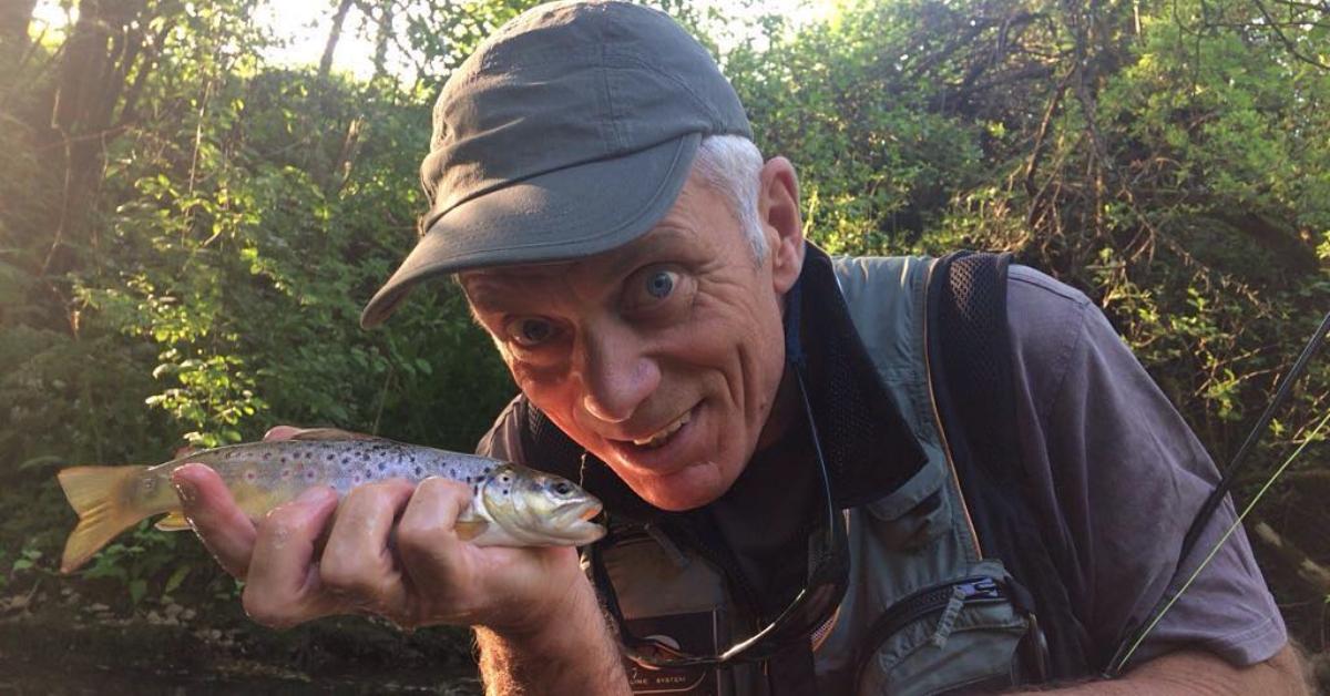 Jeremy Wade holds a small brown trout.