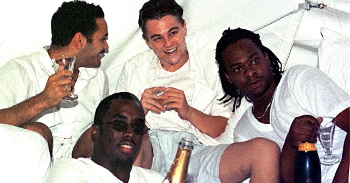 Diddy at one of his White Parties with Leonardo DiCaprio.