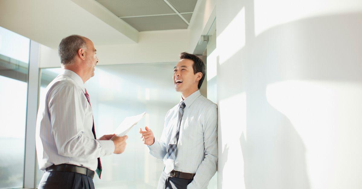 men talking in the office