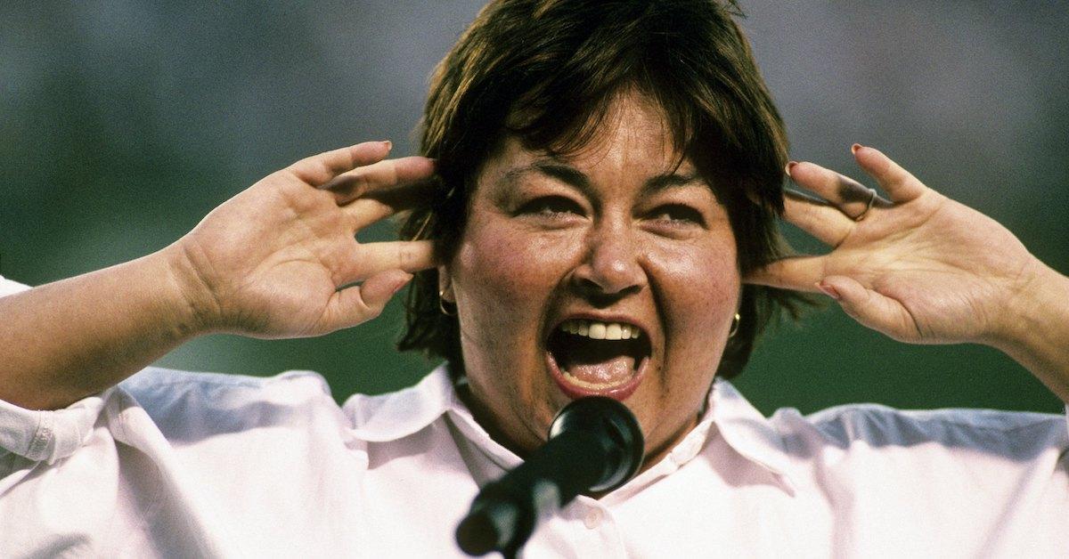 Roseanne Barr singing national anthem before San Diego Padres vs Cincinnati Reds game. Barr's off-key version was controversial. San Diego, CA 7/25/1990