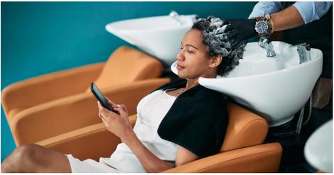 A client getting their hair washed