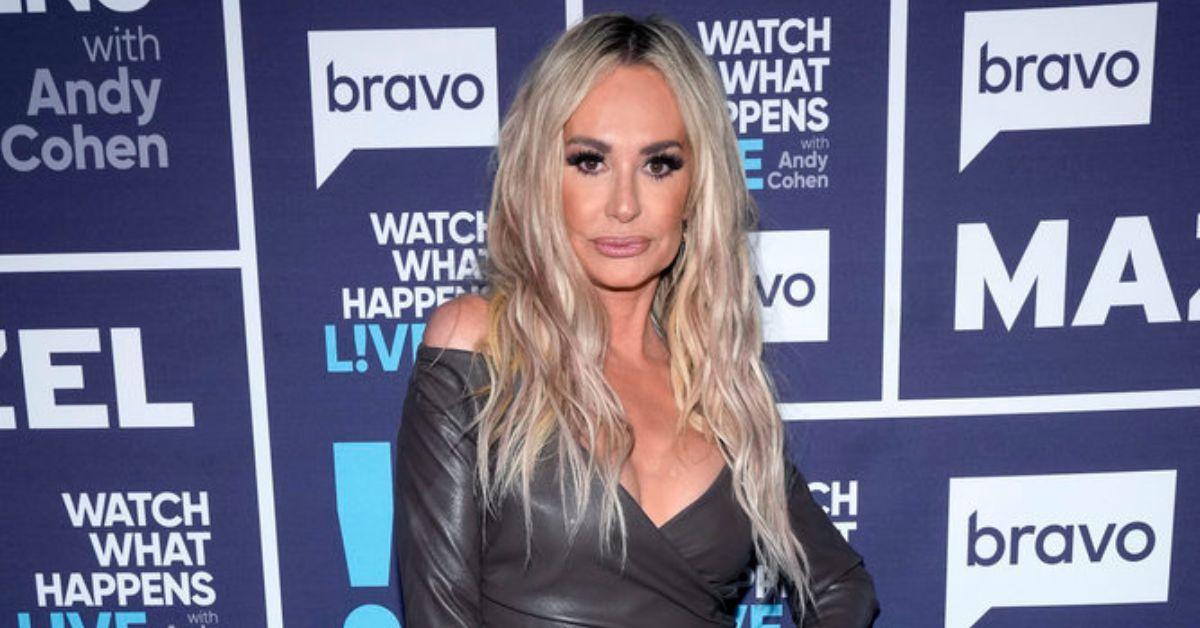 Taylor Armstrong wearing a silver dress for 'WWHL'