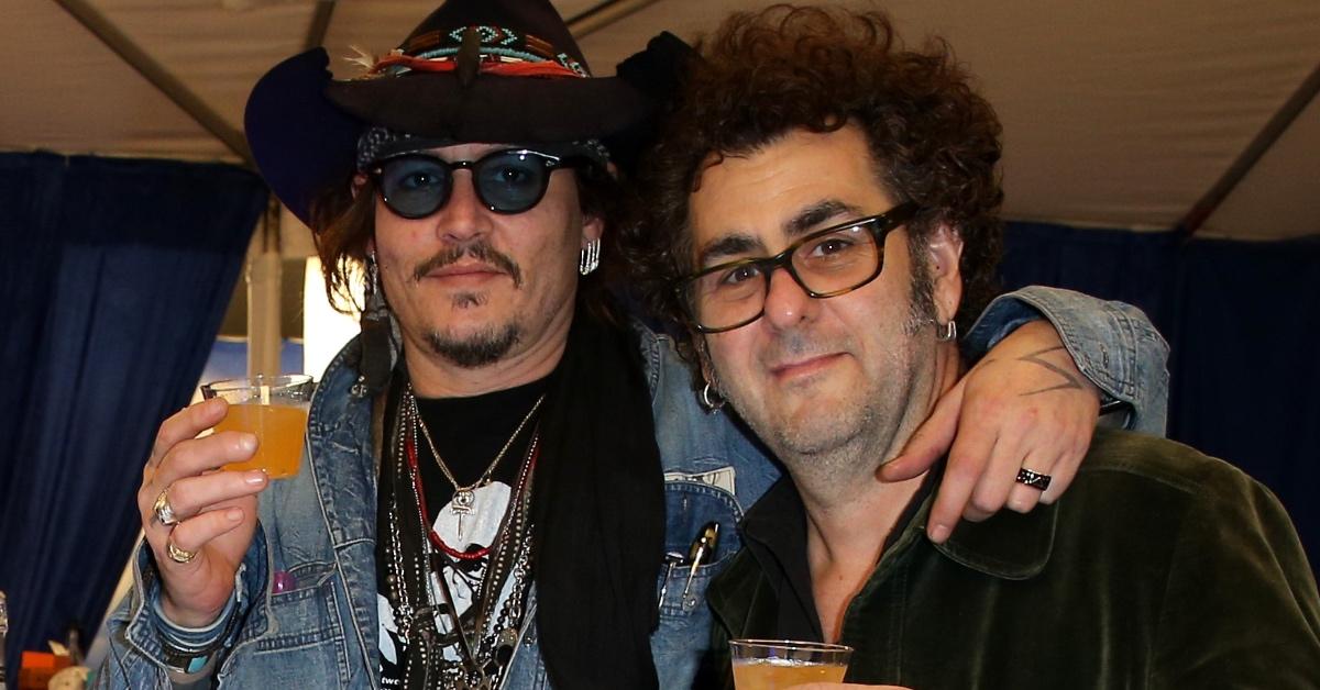 Johnny Depp and Bruce Witkin attend the Grammy Gift Lounge in 2016.