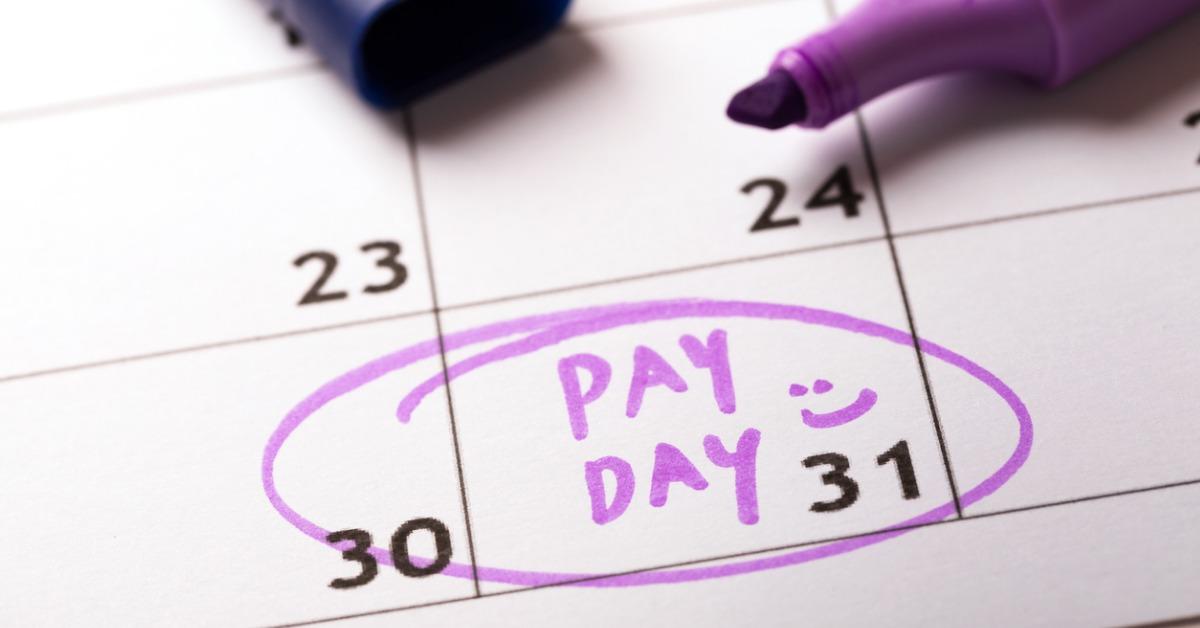 payday concept calendar with marker and circled day of salary picture id