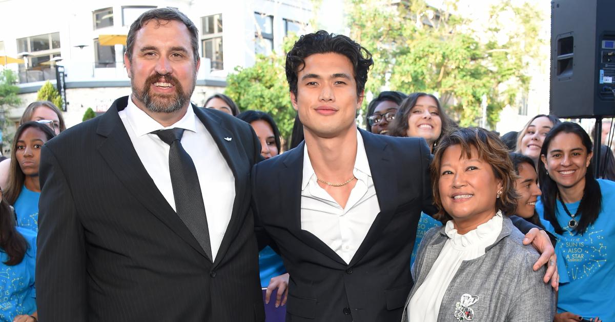 Charles Melton and his parents, Phil Melton and Sukyong Melton, at the premiere of 'The Sun Is Also a Star' on May 13, 2019.