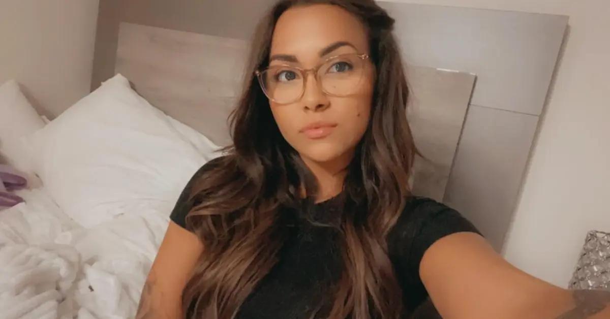 Briana DeJesus poses in a selfie and wearing glasses 