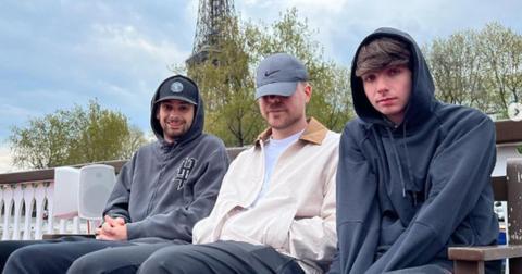 Chandler Hallow, Mr. Beast, and Karl Jacobs in front of the Eiffel Tower