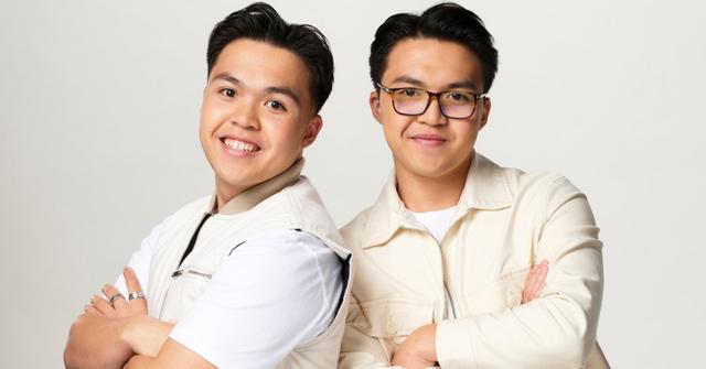 Justin Garcia and Jeremy Garcia, clad in cream-colored outfits, smile for their official 'The Voice' portrait.