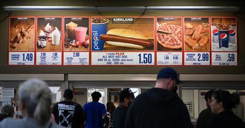 People waiting in line at a Costco food court