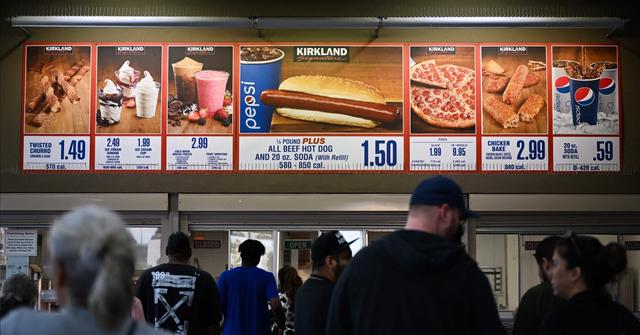People waiting in line at a Costco food court