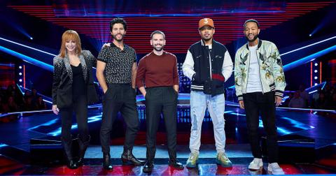 The judges for Season 25 of 'The Voice' standing on stage