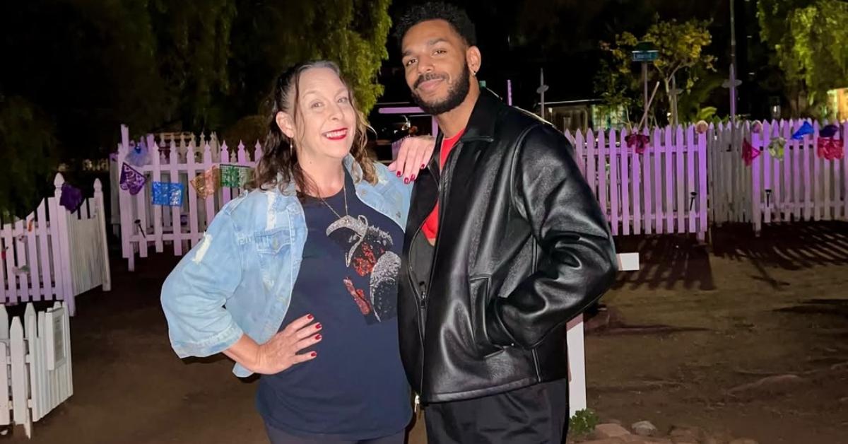 Kimberly and Jamal from 90 Day Fiancé pose outside together.
