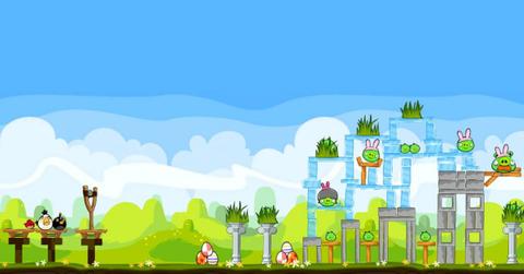 The start of a level in Angry Birds with several enemies placed on a nearby structure.