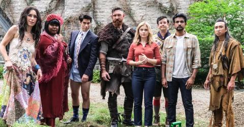 The cast of 'Ghosts' standing in a row.